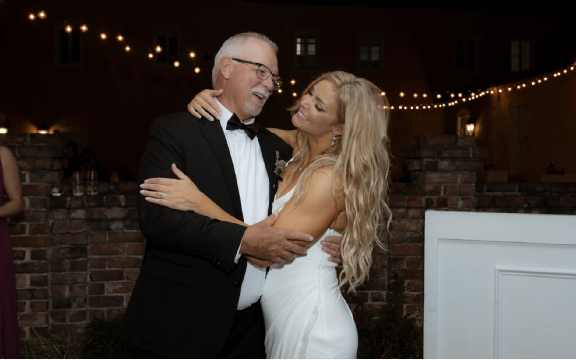 Wedding guests sharing an emotional champagne toast